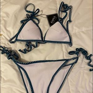 Bathing suit. Never worn, great quality.